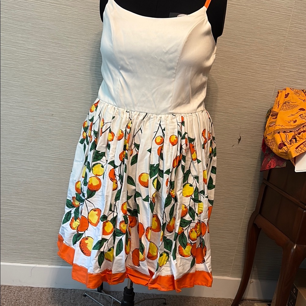 PUG Jenny dress in Oranges print